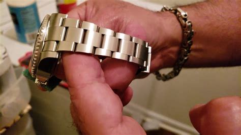 removing scratches from rolex bracelet.